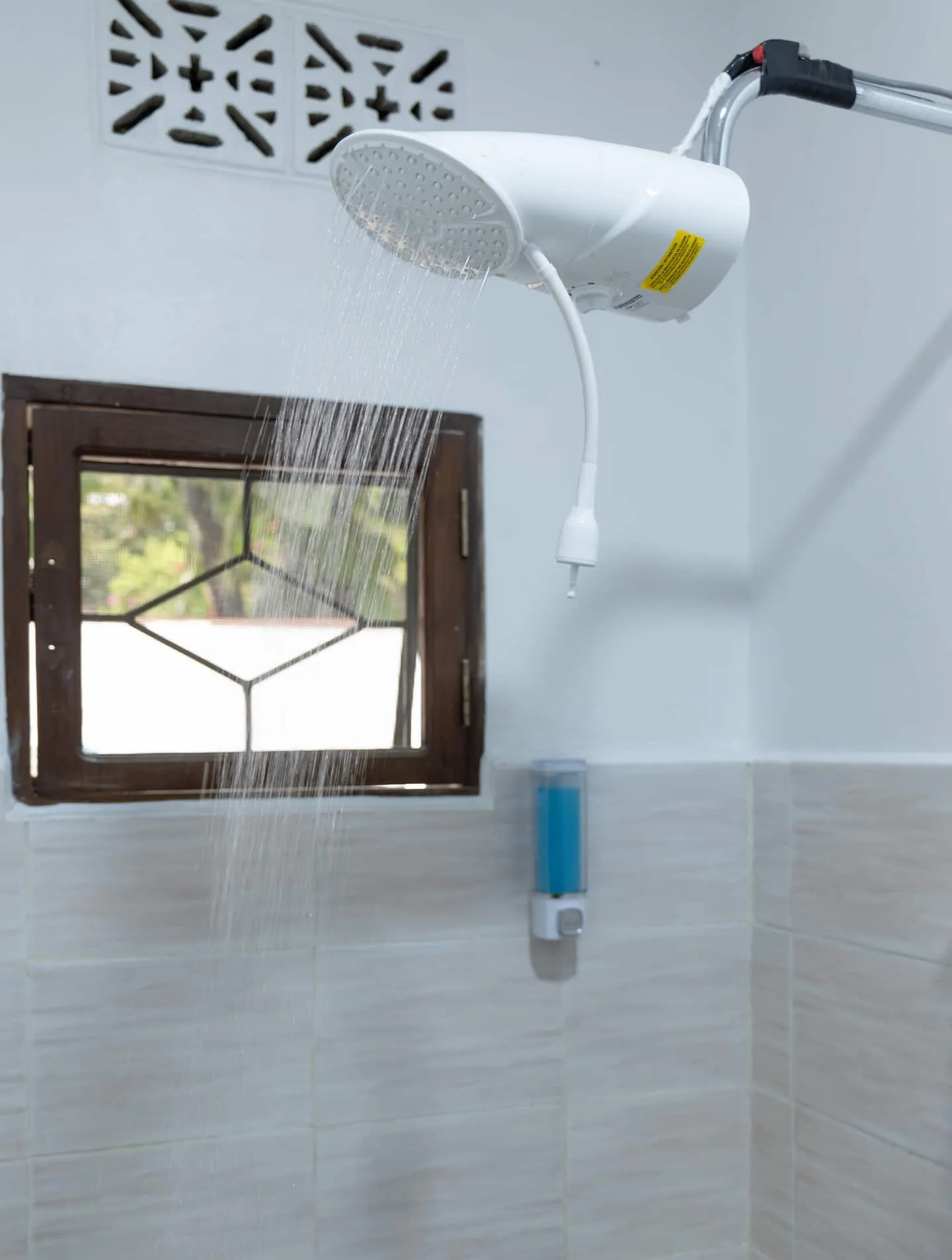 Tiled walk-in shower in the second bathroom