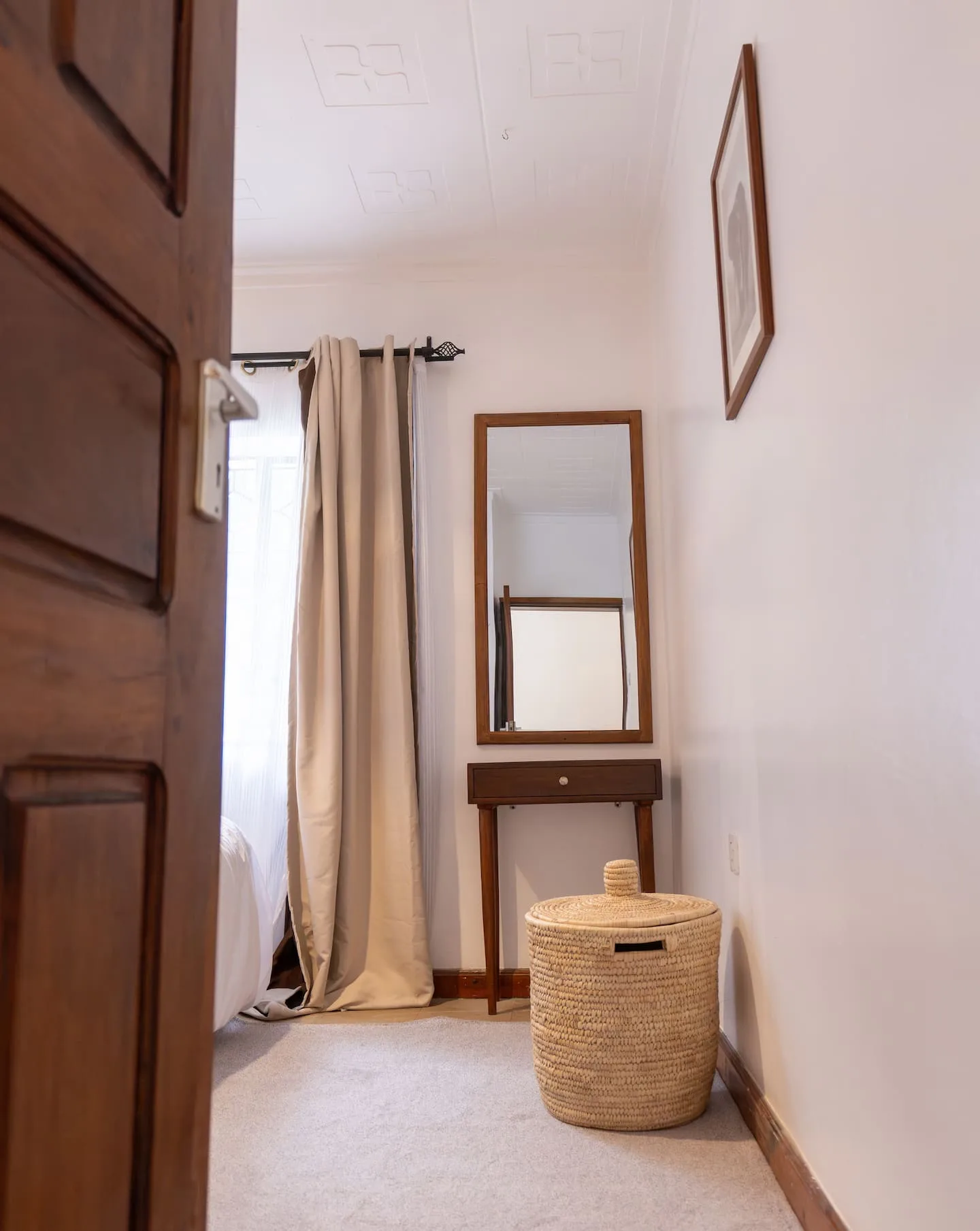 Third bedroom with bedside table and gentle lighting